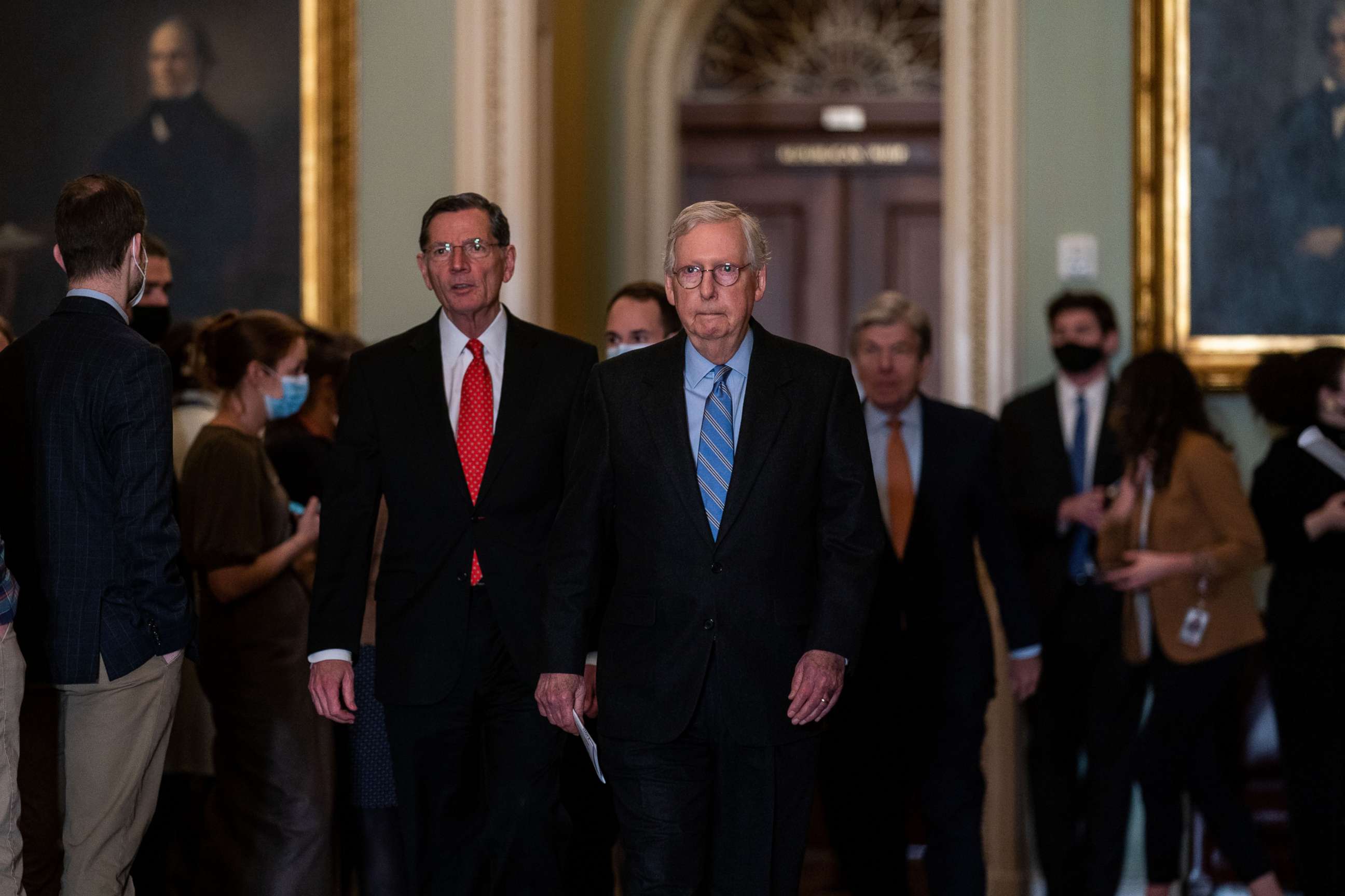 PHOTO: Senate Republican leadership, led by Senate Minority Leader Mitch McConnell, arrive for their weekly policy luncheon news conference outside the Senate Chamber on Nov. 30, 2021, in Washington, D.C.