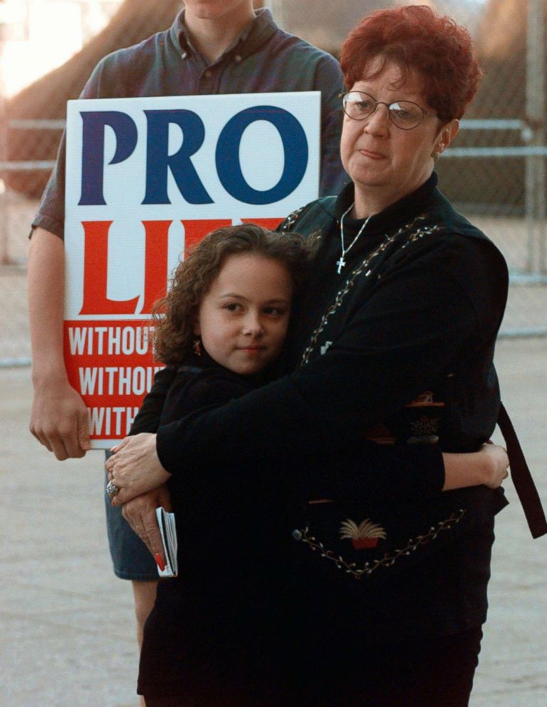 PHOTO: Norma McCorvey, right, known as Jane Roe in the landmark U.S. Supreme Court ruling, stands with a friend at an Operation Rescue rally in downtown Dallas, Jan. 22, 1997. 