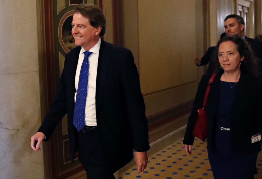 PHOTO: White House Counsel Don McGahn smiles ahead of a Senate vote to advance Brett Kavanaugh's nomination to the Supreme Court, on Capitol Hill, Oct. 5, 2018, in Washington. 