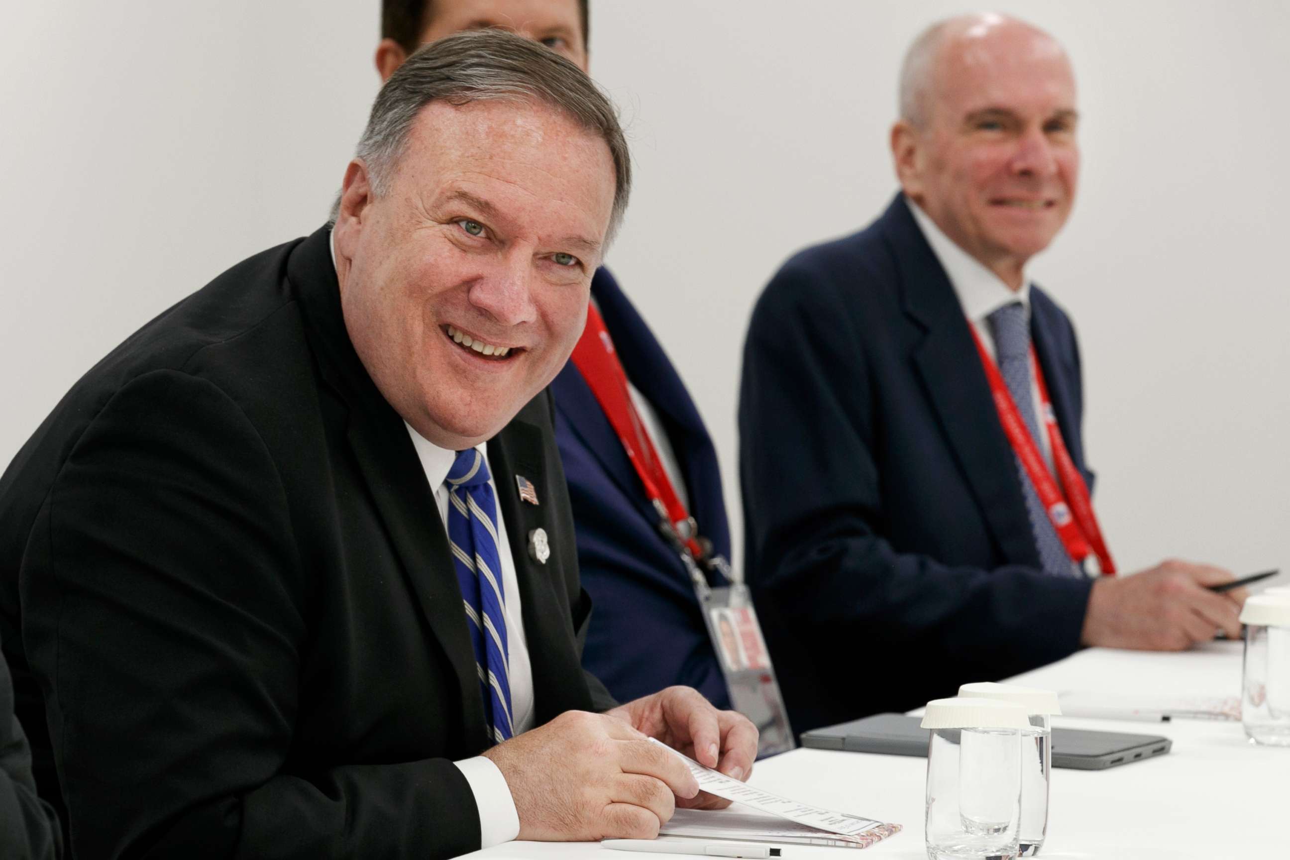 PHOTO: FILE - In this June 28, 2019, file photo, Secretary of State Mike Pompeo, left, sits down for a meeting in Osaka, Japan, during the G-20 summit, with senior adviser Michael McKinley, right.