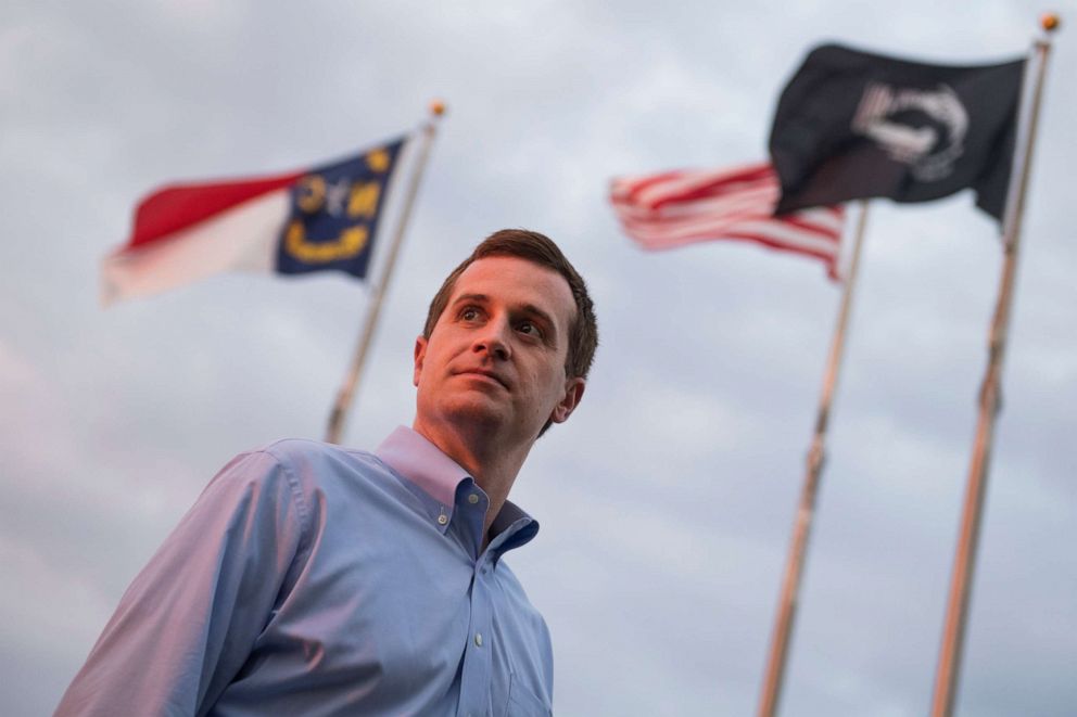 PHOTO: Dan McCready, Democratic candidate for North Carolina's 9th District, talks with voters outside of the First United Methodist Church during his education tour in Pembroke, N.C., on Saturday, August 10, 2019.