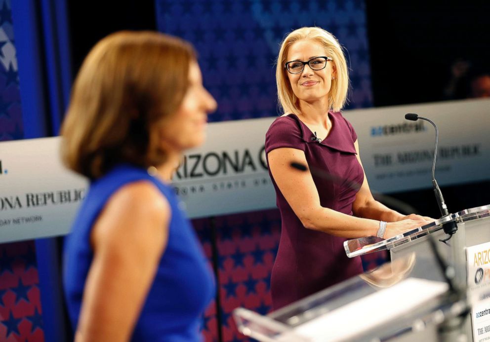 PHOTO: U.S. Senate candidates, Rep. Martha McSally and Rep. Kyrsten Sinema prepare their remarks prior to a televised debate, Oct. 15, 2018, in Phoenix.