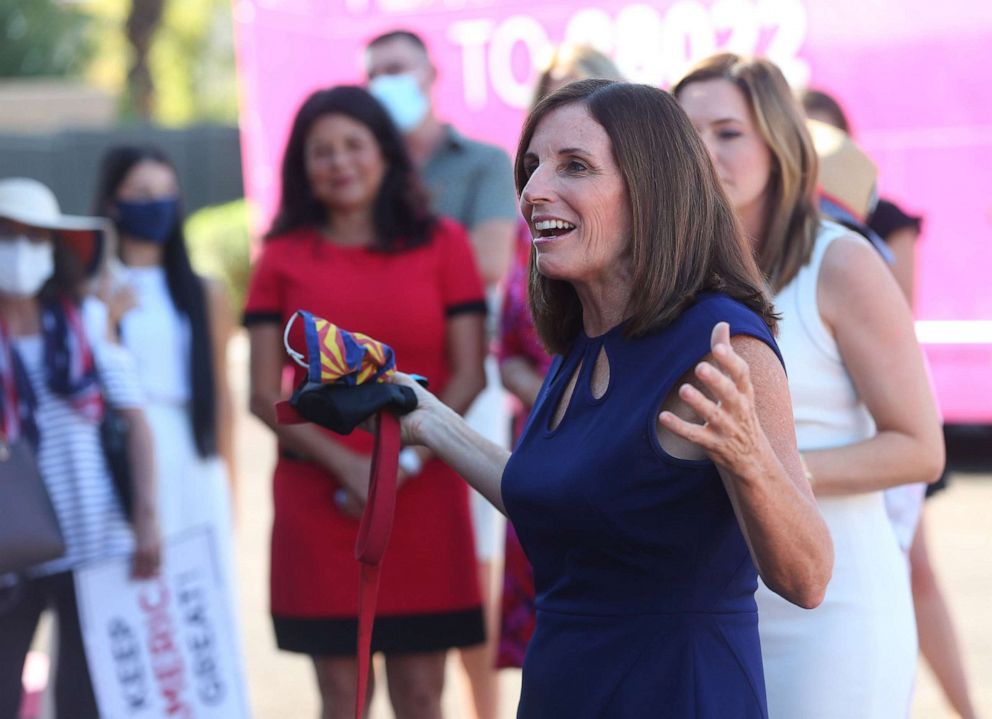 PHOTO: Sen. Martha McSally speaks to supporters during a stop for the Women for Trump bus tour in Phoenix, Sept. 2, 2020.