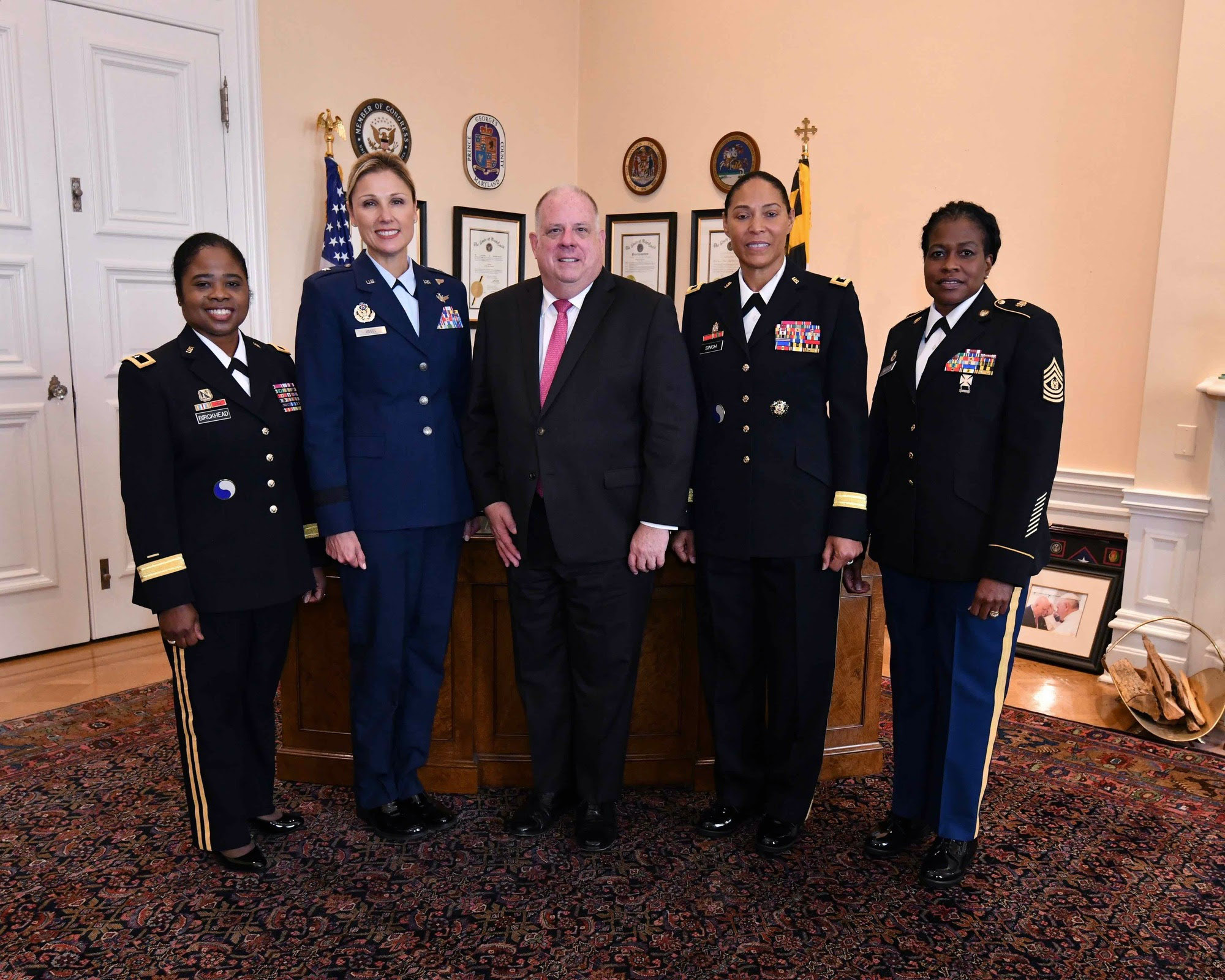PHOTO: Maryland Governor Larry Hogan poses for a photo with members of the Maryland National Guard’s first-ever all-female command staff.