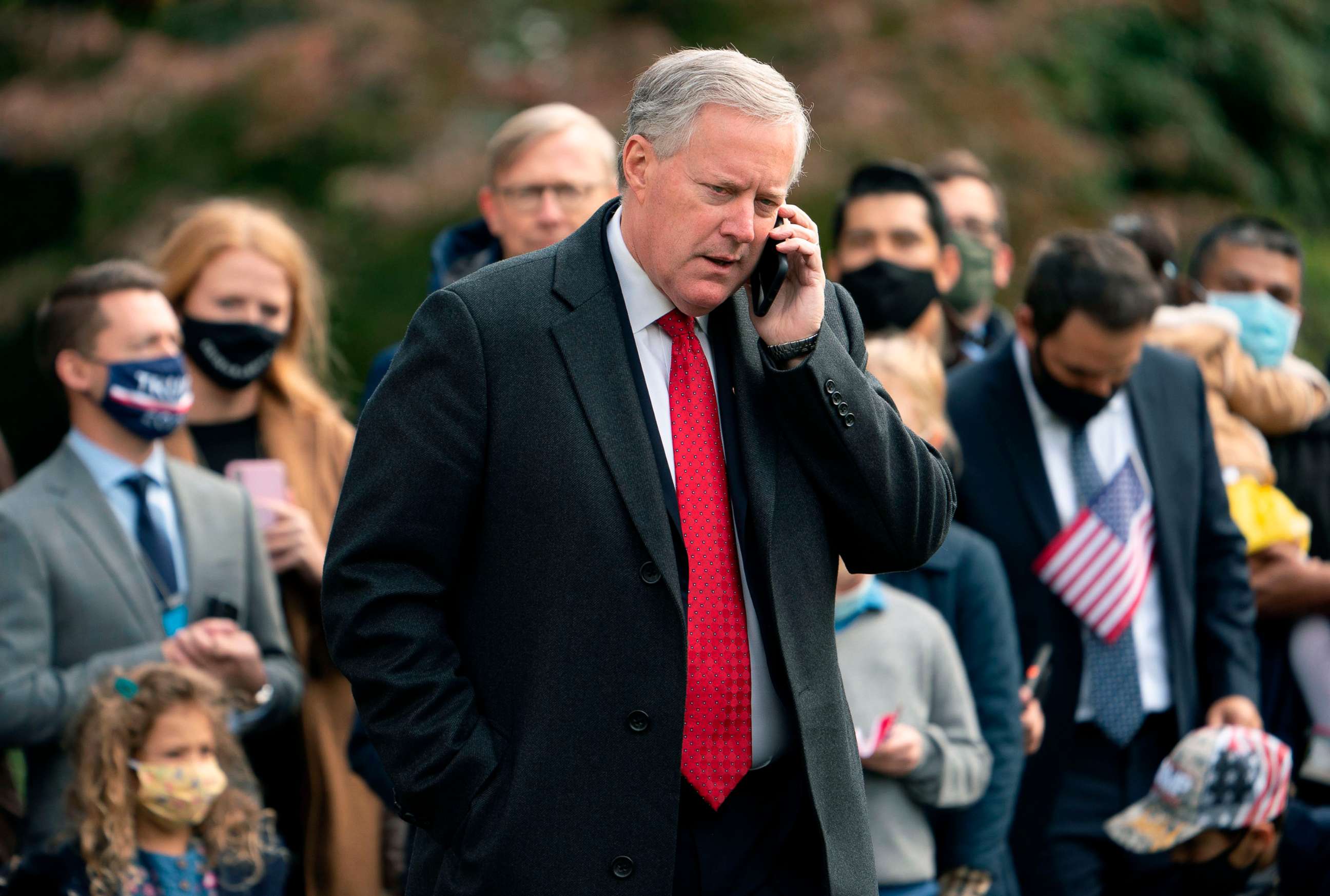 PHOTO: White House Chief of Staff Mark Meadows speaks on his phone as he waits for President Donald Trump to depart the White House, Oct. 30, 2020.