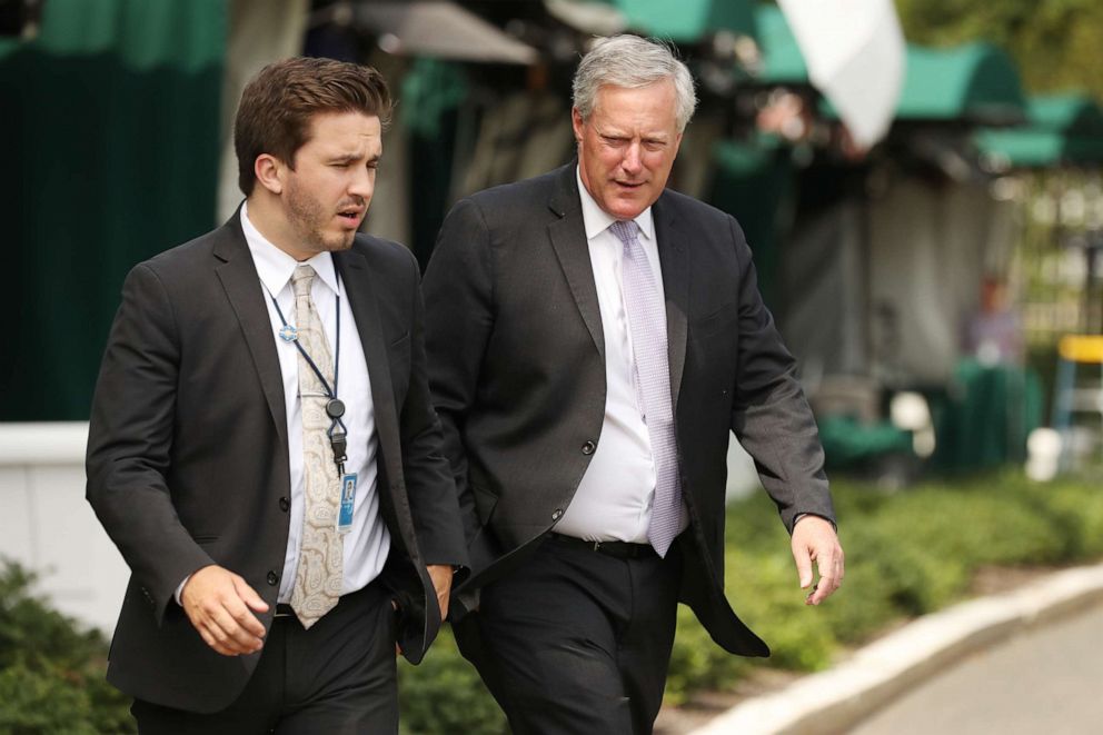 PHOTO: White House Chief of Staff Mark Meadows returns to the West Wing following an interview with FOX News outside the White House on Aug. 21, 2020, in Washington.