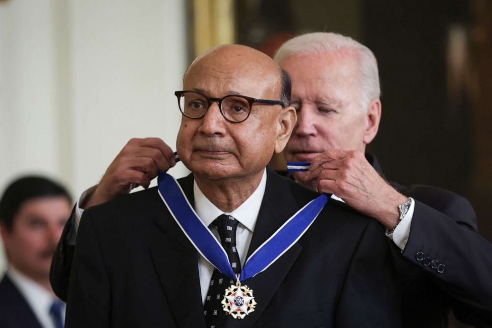 PHOTO: President Joe Biden presents the Presidential Medal of Freedom to Khizr Khan, Gold Star father of U.S. Army Captain Humayun Khan, during a ceremony in the East Room of the White House, July 7, 2022, in Washington, D.C.