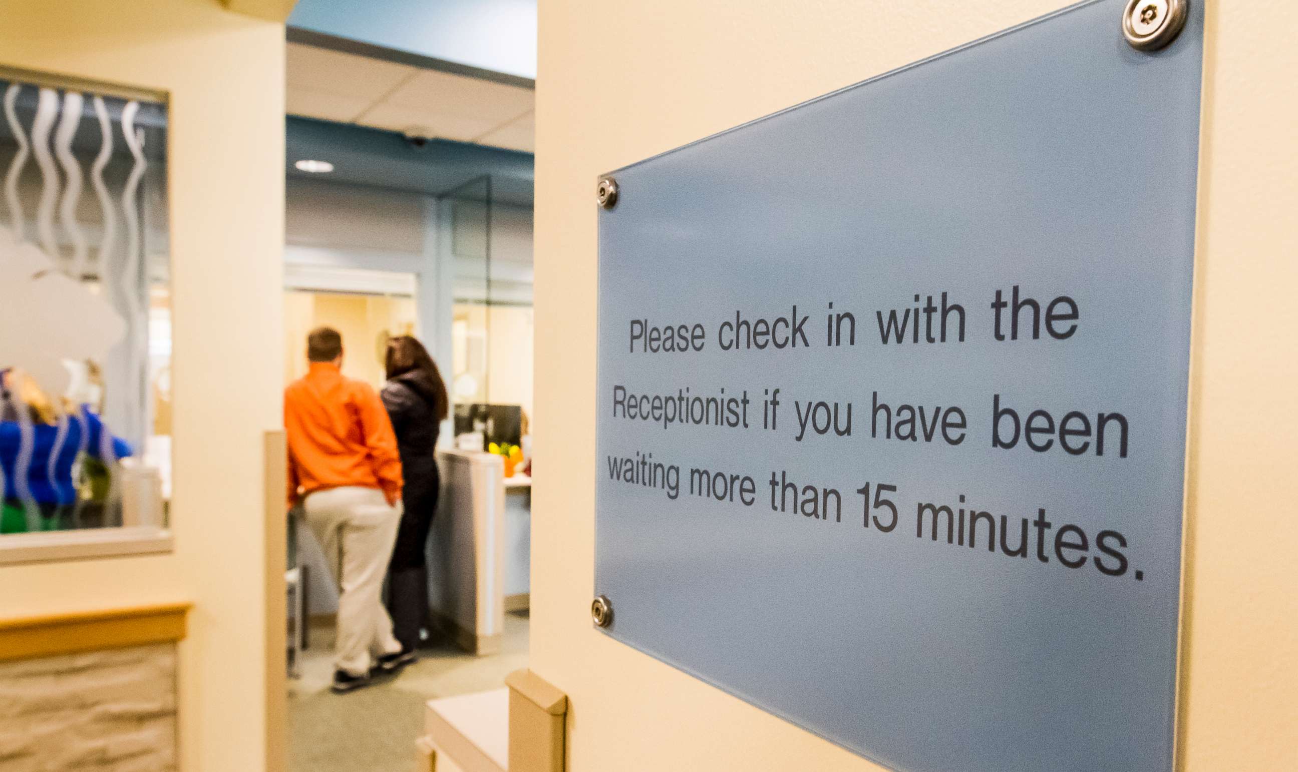 PHOTO: People stand in the reception area of a health care provider in Maine, Jan. 20, 2016.