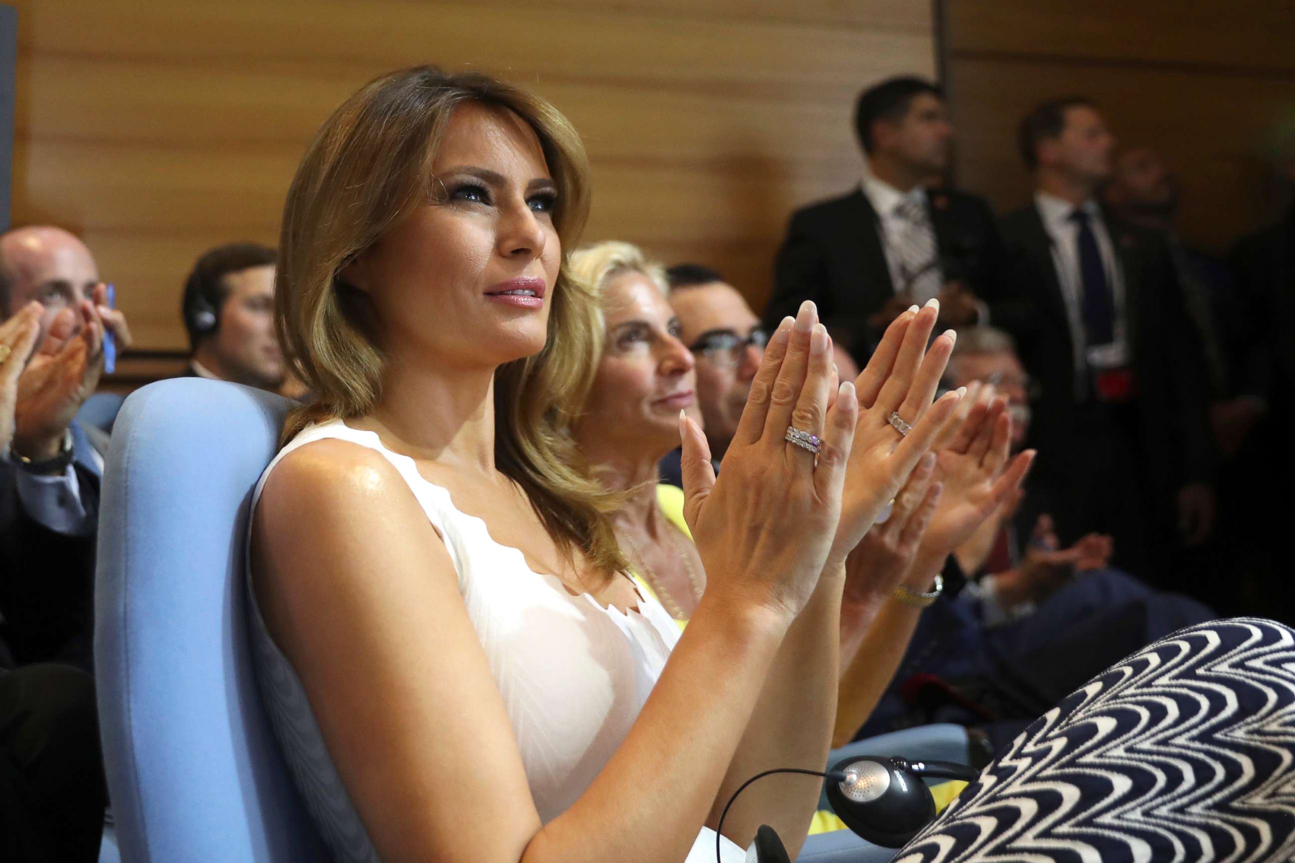 PHOTO: First lady Melania Trump claps while President Donald Trump and French President Emmanuel Macron participate in a joint press conference at the G-7 summit in Biarritz, France, Aug. 26, 2019. 