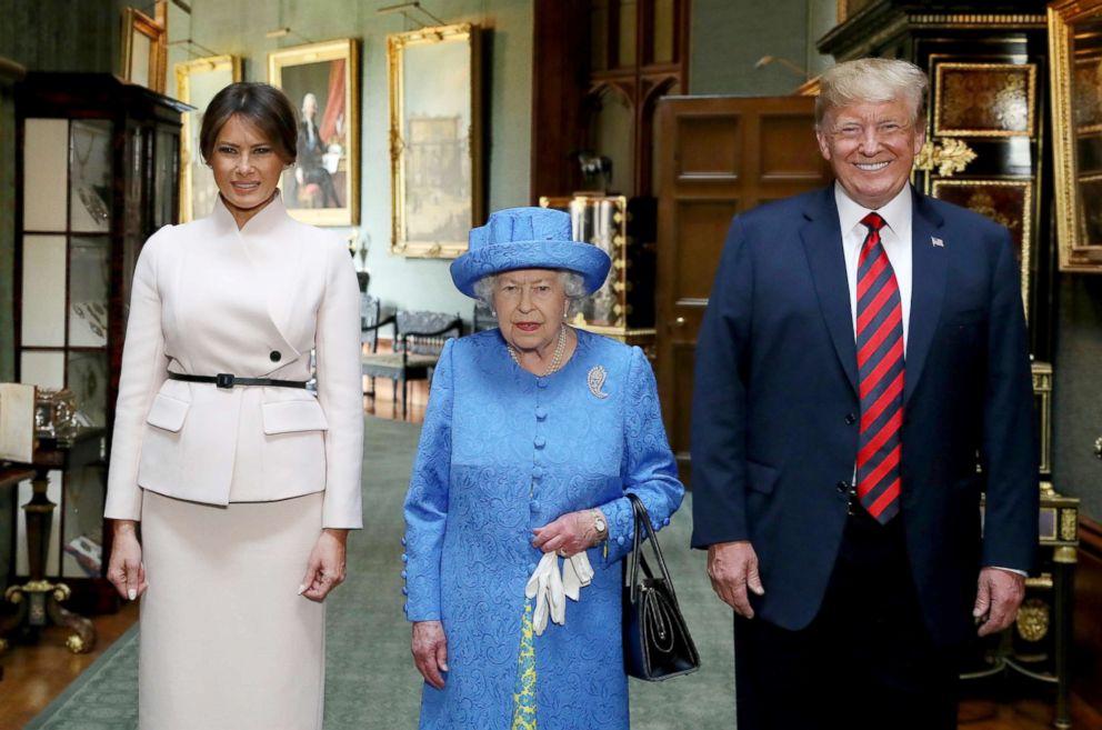 PHOTO: First lady Melania Trump, Britain's Queen Elizabeth and President Donald Trump in the Grand Corridor during their visit to Windsor Castle, Windsor, Britain, July 13, 2018.