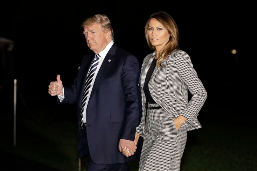 PHOTO: President Donald Trump and First Lady Melania Trump walk on the South Lawn of the White House in Washington upon their return from meeting with three detained Americans who were released by North Korea at Joint Base Andrews, May 10, 2018.