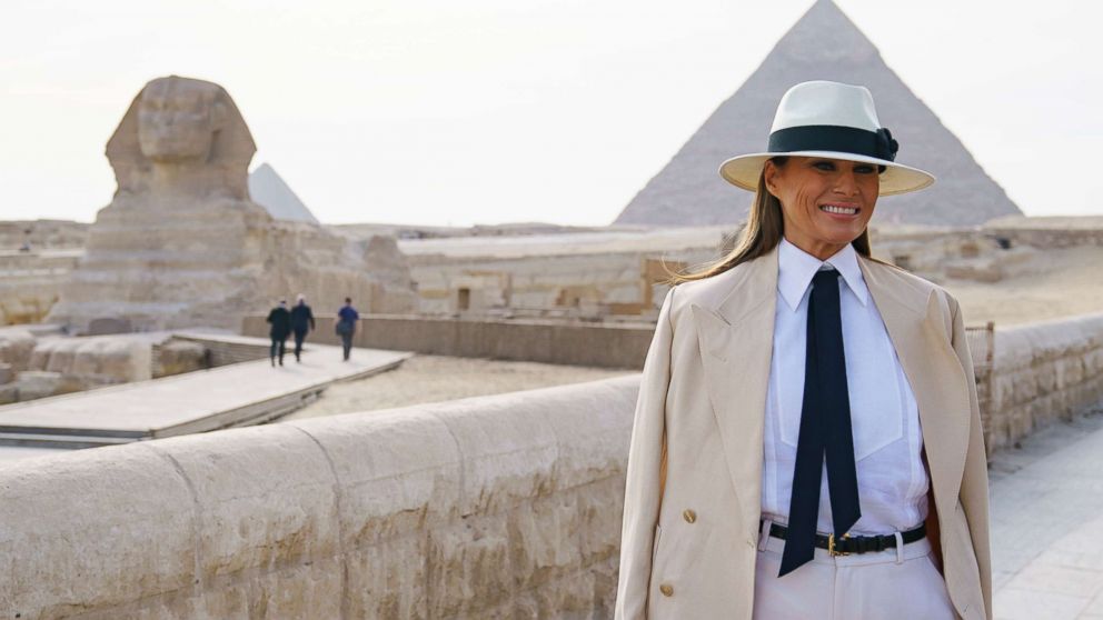 First lady Melania Trump visits the ancient statue of Sphinx, with the body of a lion and a human head, at the historic site of Giza Pyramids in Giza, near Cairo, Egypt, Oct. 6, 2018.