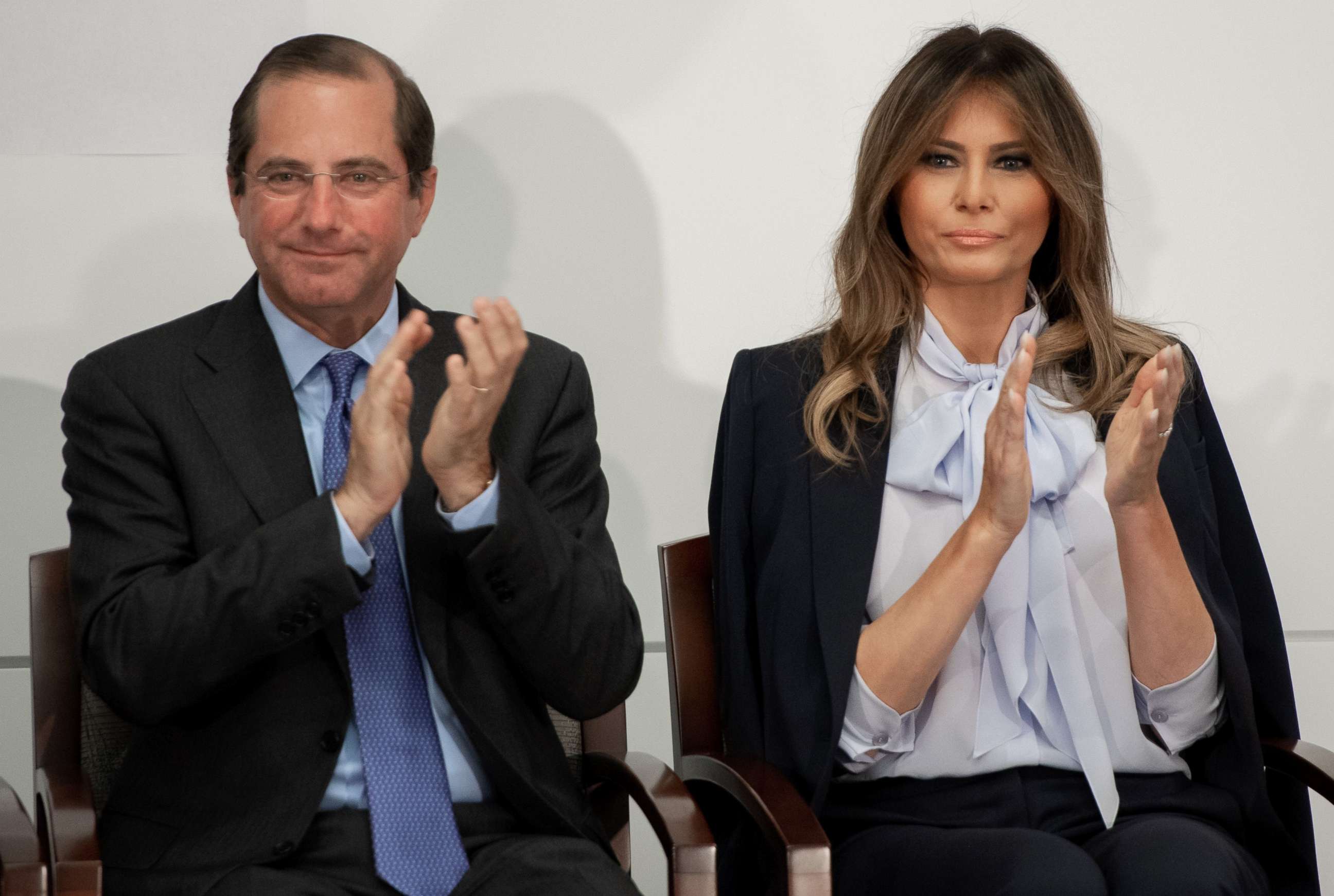PHOTO: First Lady Melania Trump applauds as she arrives alongside US Secretary of Health and Human Services Alex Azar, left, during the Federal Partners in Bullying Prevention (FPBP) Cyberbullying Prevention Summit in Rockville, Maryland, Aug. 20, 2018.