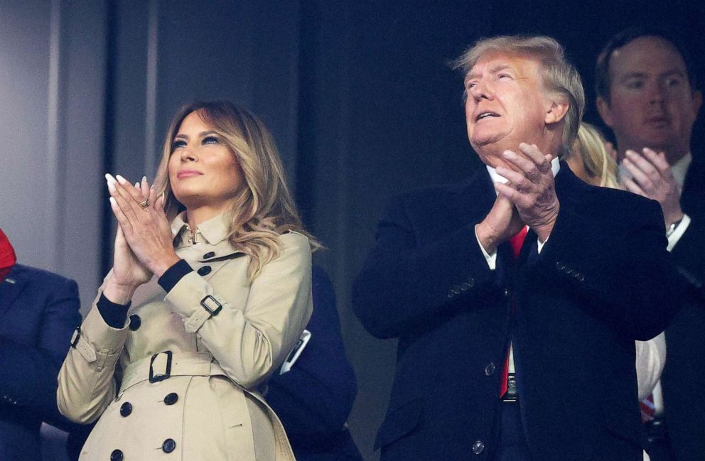 PHOTO: Former first lady Melania Trump and former president of the United States Donald Trump attend Game Four of the World Series between the Houston Astros and the Atlanta Braves in Atlanta, Oct. 30, 2021.