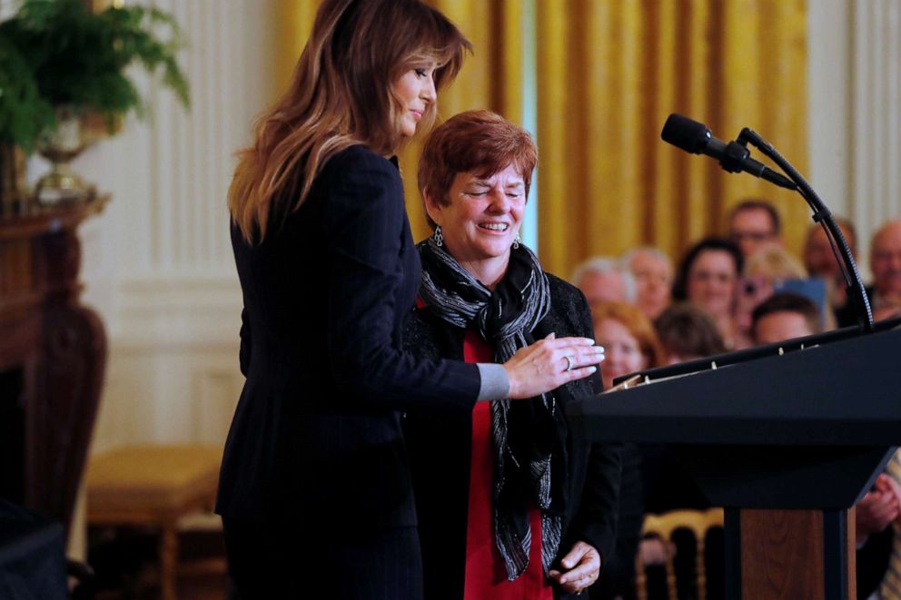 PHOTO: First lady Melania Trump brings Betty Henderson, who wrote to the first lady after her son died from an opioid overdose, to the stage as she addresses an opioid crisis summit at the White House in Washington, March 1, 2018.