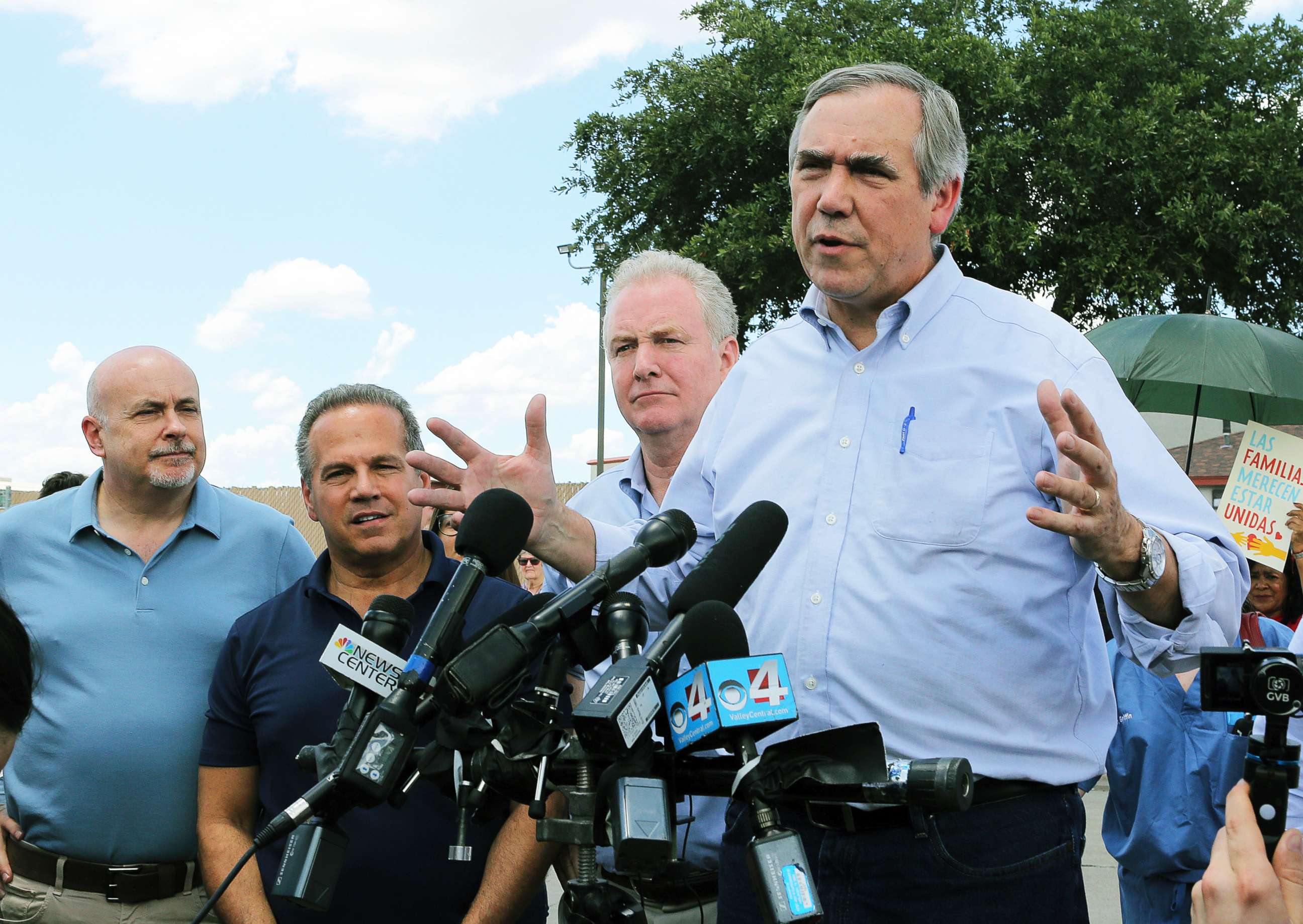 PHOTO: Sen. Jeff Merkley, right, D-Ore., speaks to the media along with Sen. Chris Van Hollen, center, D-Md., in front of the U.S. Customs and Border Protection's Rio Grande Valley Sector's Centralized Processing Center in McAllen, Texas, June 17, 2018.