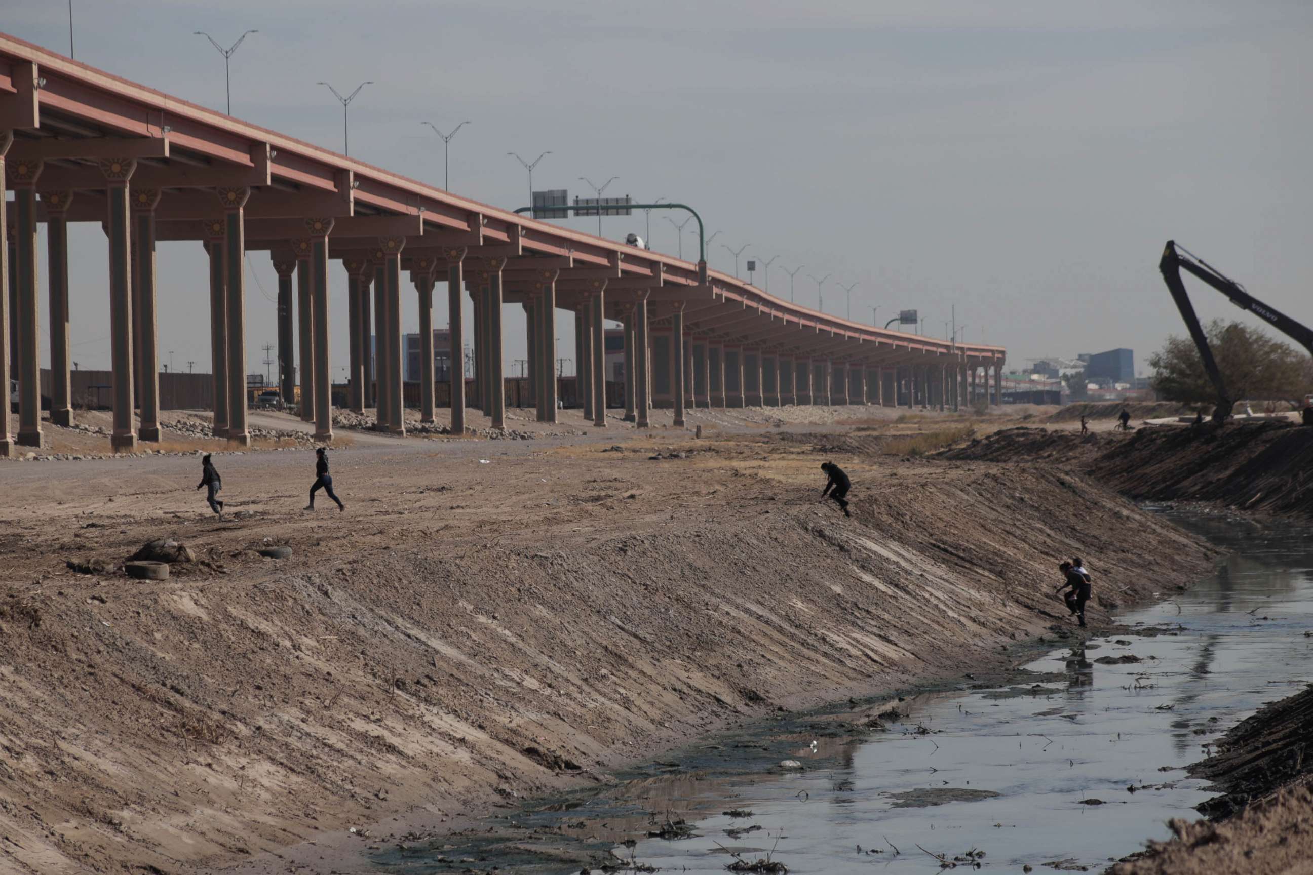 PHOTO: Migrants of Cuban origin cross the Rio Bravo to surrender to the immigration authorities to try to request political asylum in the United States, in Juarez, Chihuahua, Mexico, on Feb. 2, 2021.