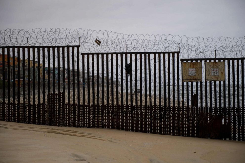 PHOTO: The border wall crosses the beach as it ends in the Pacific Ocean along the US-Mexico border between San Diego and Tijuana, on May 10, 2021, at International Friendship Park in San Diego County, Calif.