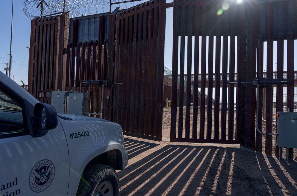 PHOTO: A United States Border Patrol vehicle waits for a gate on the border wall to open in downtown El Paso, Texas on June 3, 2022. 