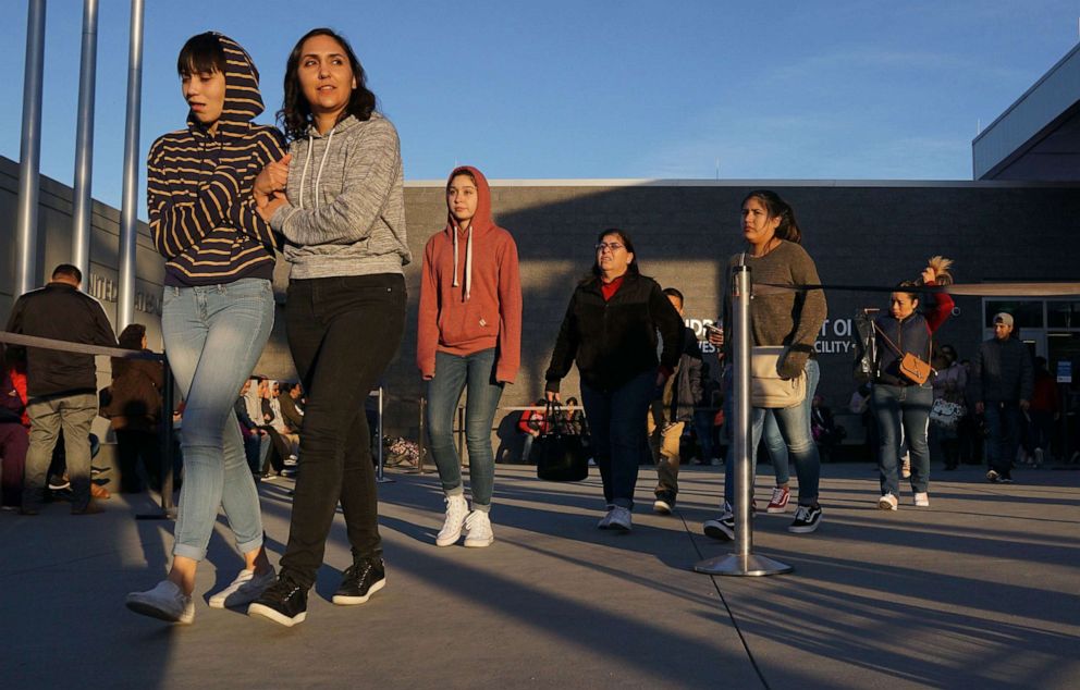 PHOTO: Pedestrians, coming from Mexico, exit the San Ysidro Port of Entry along the U.S./Mexico border in San Ysidro, Calif., Dec. 29, 2019.