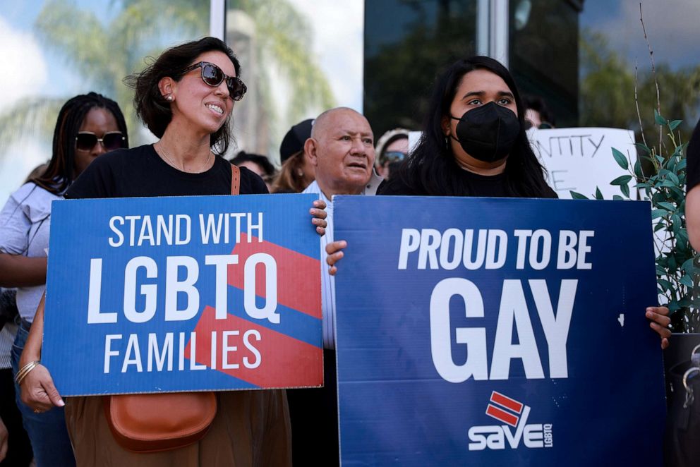 PHOTO: In this March 9, 2022, file photo, people protest the Parental Rights in Education bill, dubbed the "Don't Say Gay" bill by LGBTQ activists, in Miami.