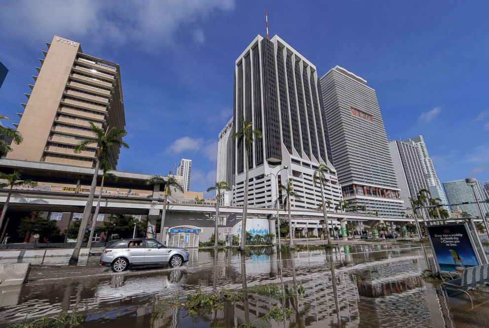 PHOTO: Some street flooding persists on Biscayne Boulevard after Hurricane Irma struck in Miami, Sept. 11, 2017.