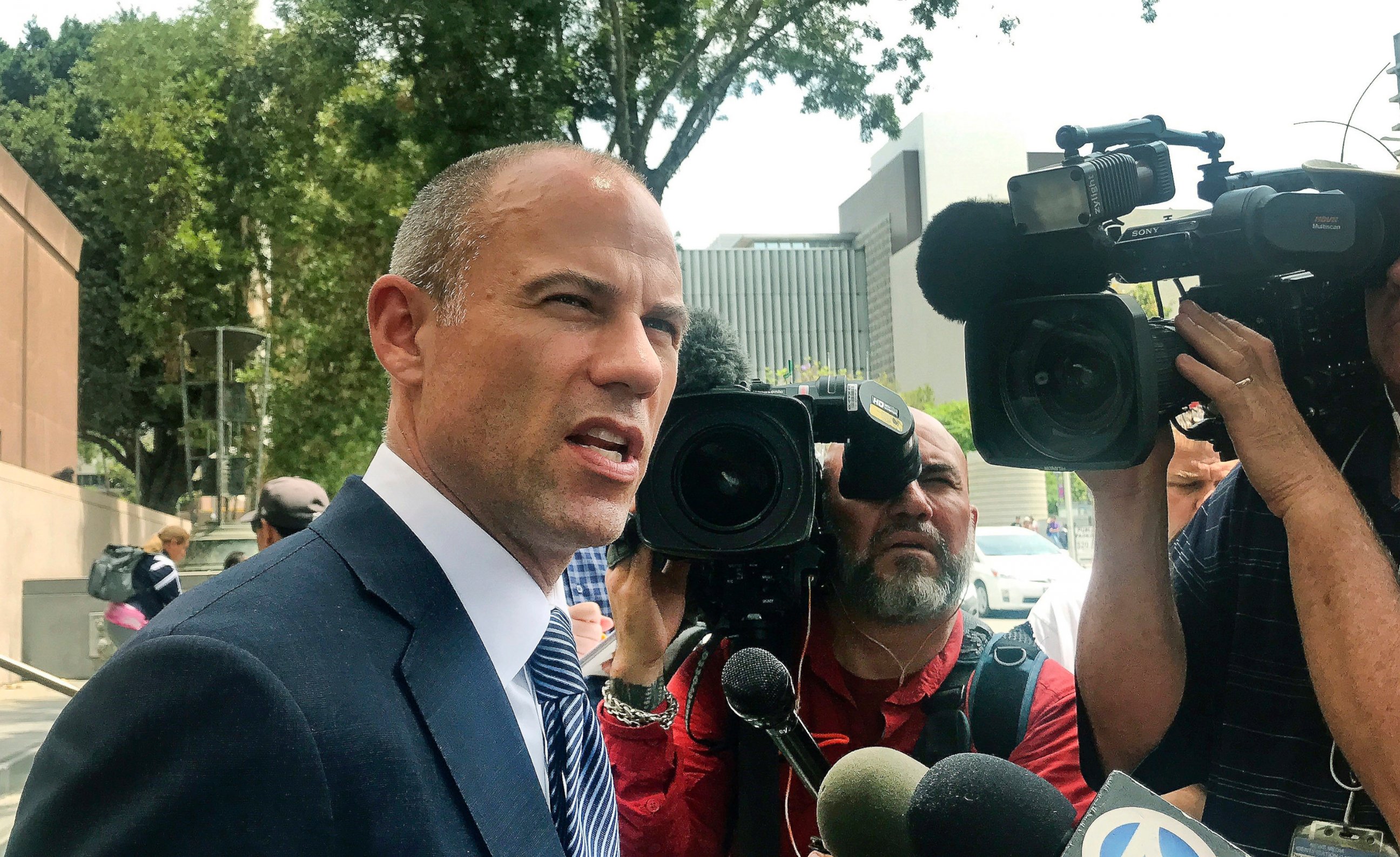 Porn actress Stormy Daniels' lawyer Michael Avenatti talks to the media outside of Los Angeles County Superior Court after a hearing in Los Angeles Tuesday, July 10, 2018. 