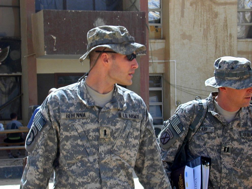 PHOTO: 1st Lt. Michael C. Behenna, left, and his defense attorney Capt. Tom Clark, right, walk in Camp Speicher north of Baghdad, Iraq, Sept. 21, 2008.