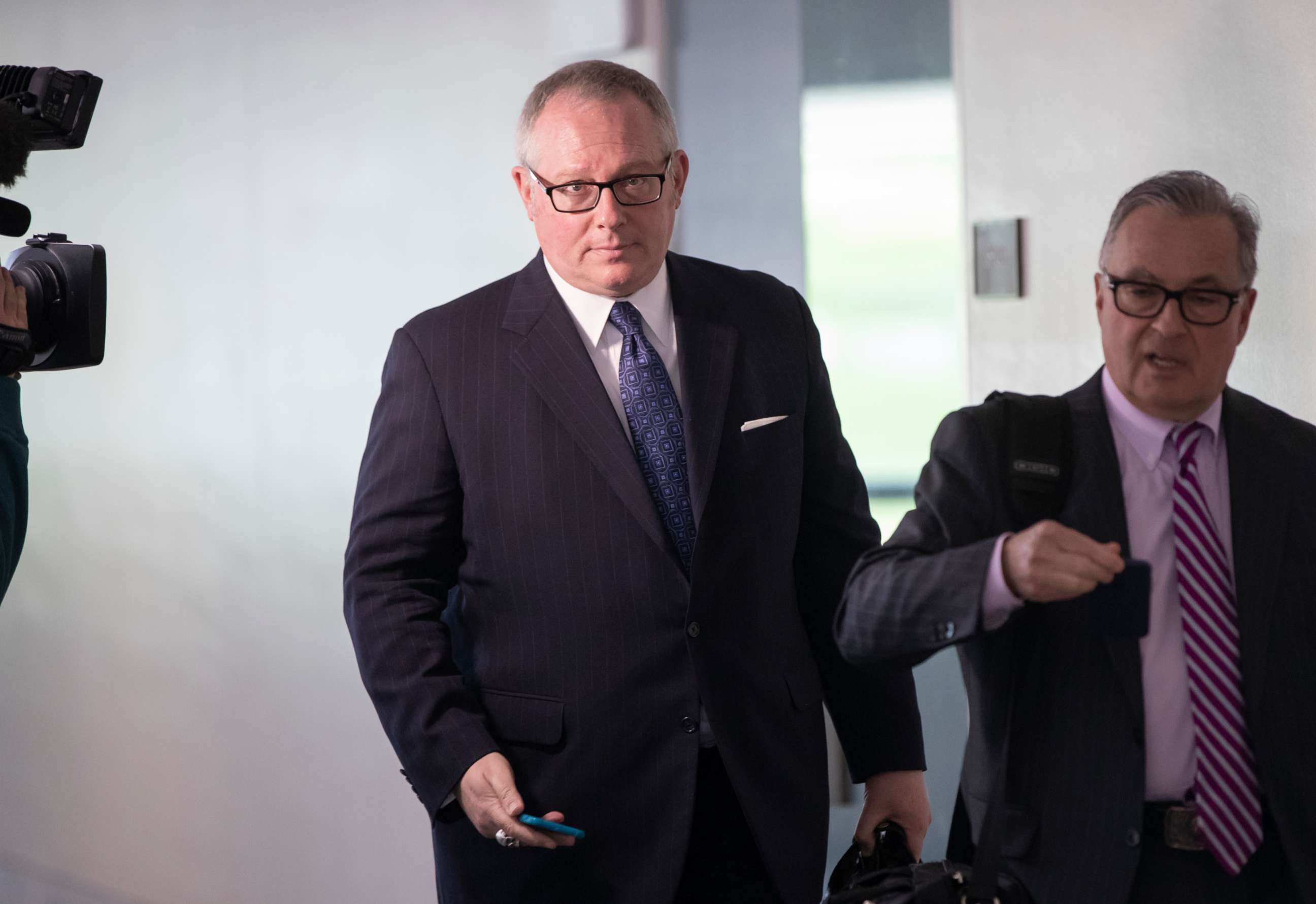 PHOTO: Former Donald Trump campaign official Michael Caputo, left, joined by his attorney Dennis C. Vacco, leaves after being interviewed by Senate Intelligence Committee staff on Capitol Hill in Washington, May 1, 2018.