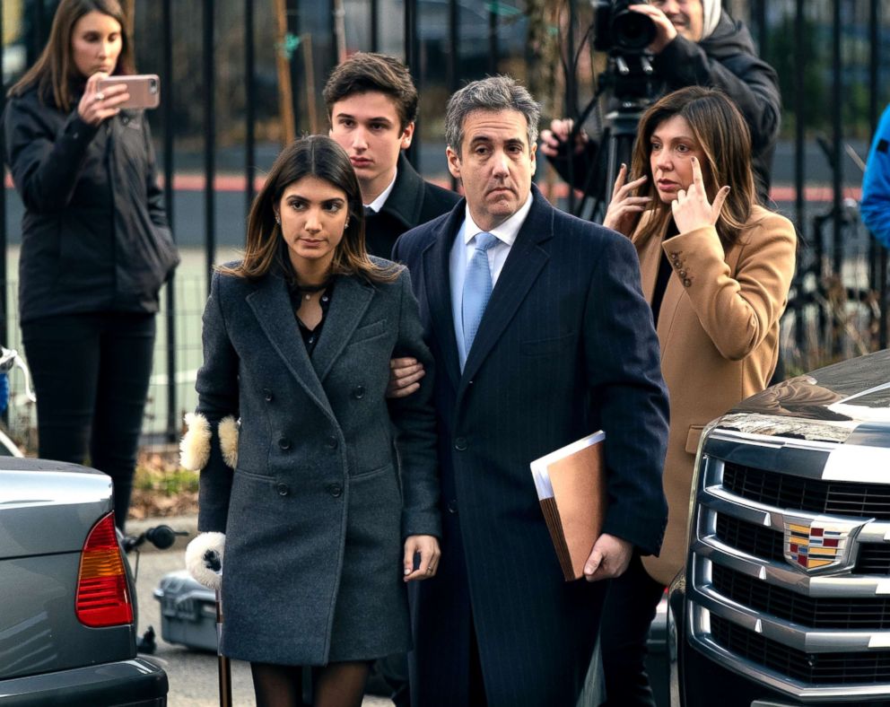 PHOTO: Michael Cohen, right, President Donald Trump's former lawyer, accompanied by his children and wife, arrive at federal court for his sentencing in New York, Dec. 12, 2018.