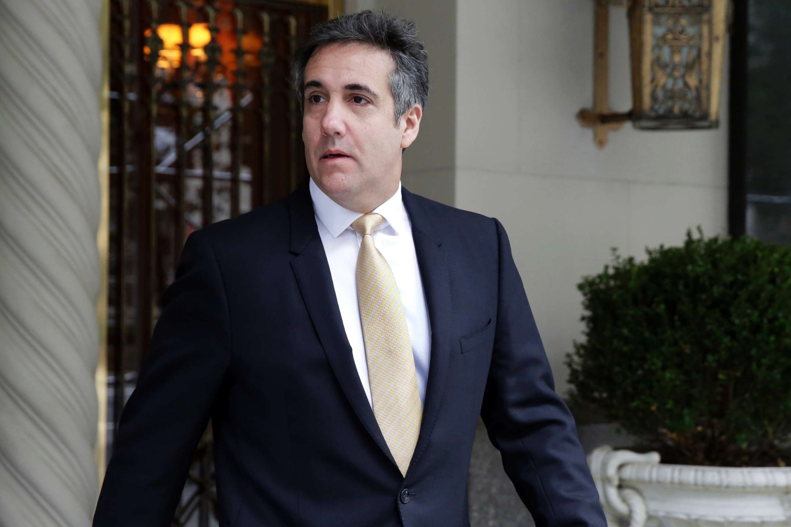 PHOTO: Michael Cohen, former personal lawyer to President Donald Trump, leaves his apartment building, in New York, Aug. 21, 2018.