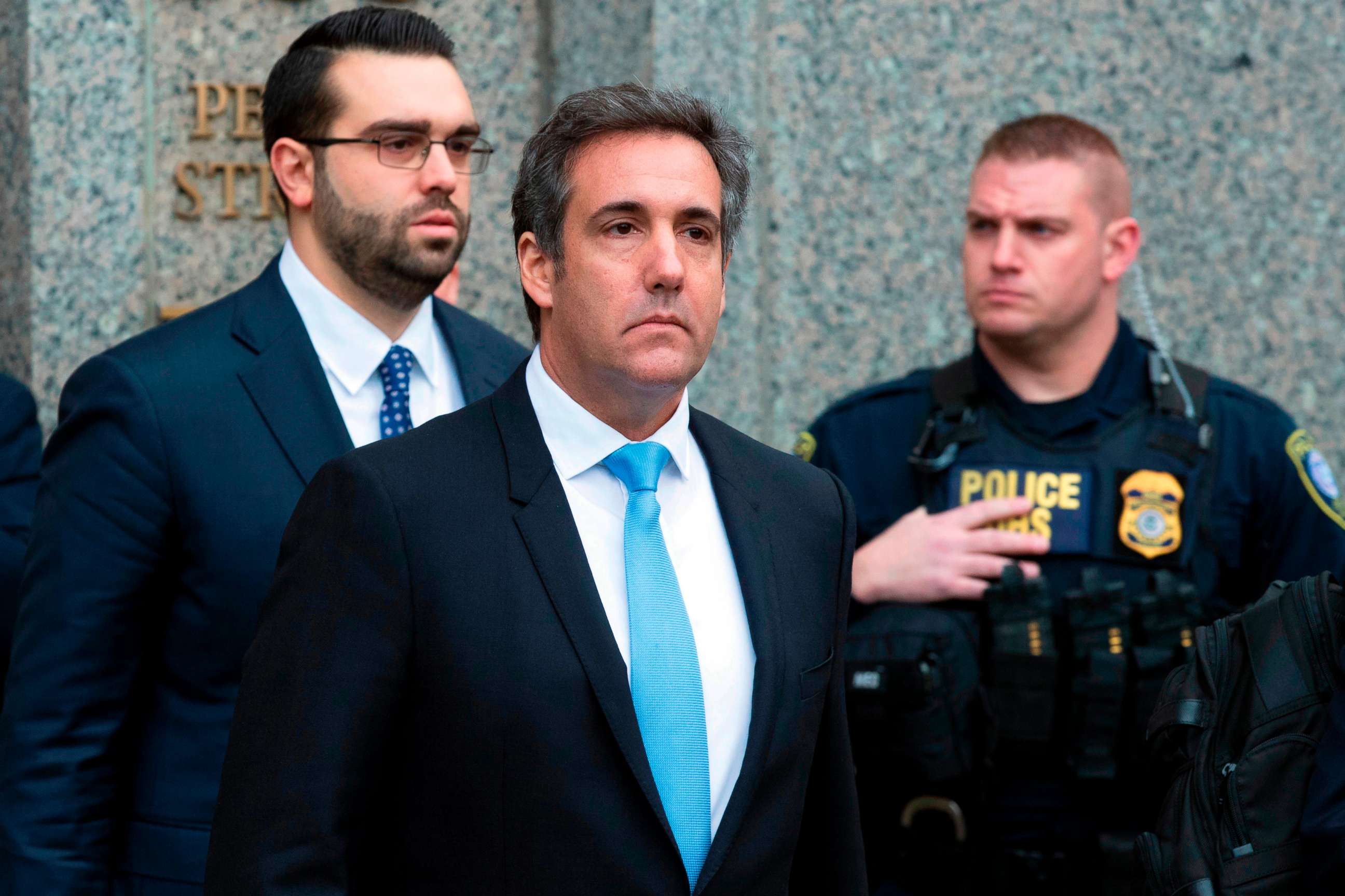 PHOTO: Michael Cohen, President Donald Trump's personal attorney, center, leaves federal court, in New York, April 16, 2018.