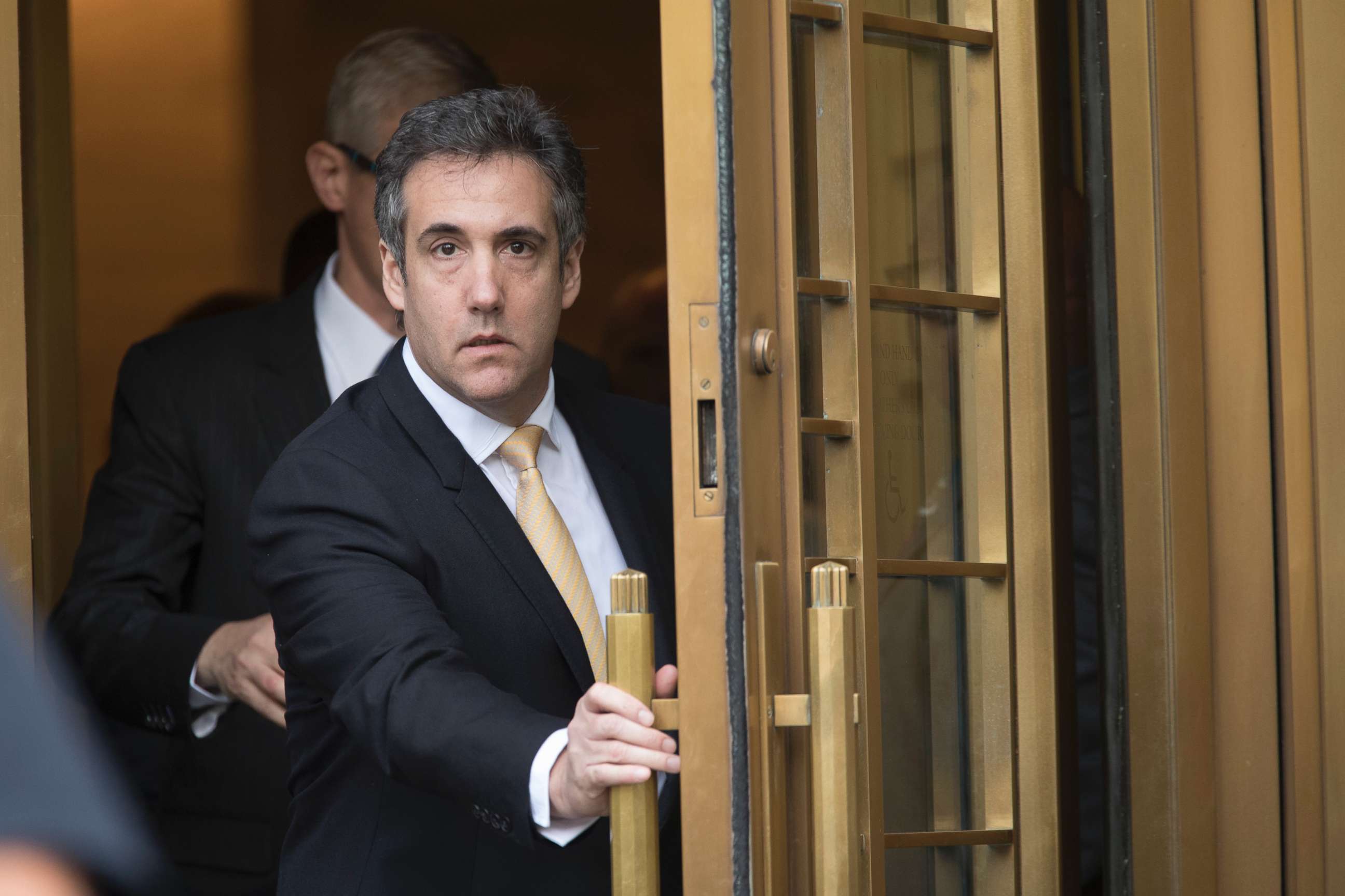 PHOTO: Michael Cohen leaves Federal court, Aug. 21, 2018, in New York City.