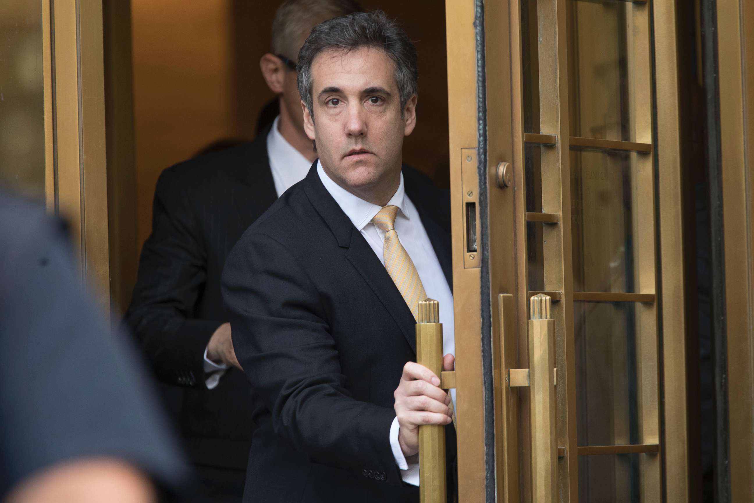 PHOTO: Michael Cohen leaves Federal court, Aug. 21, 2018, in New York.