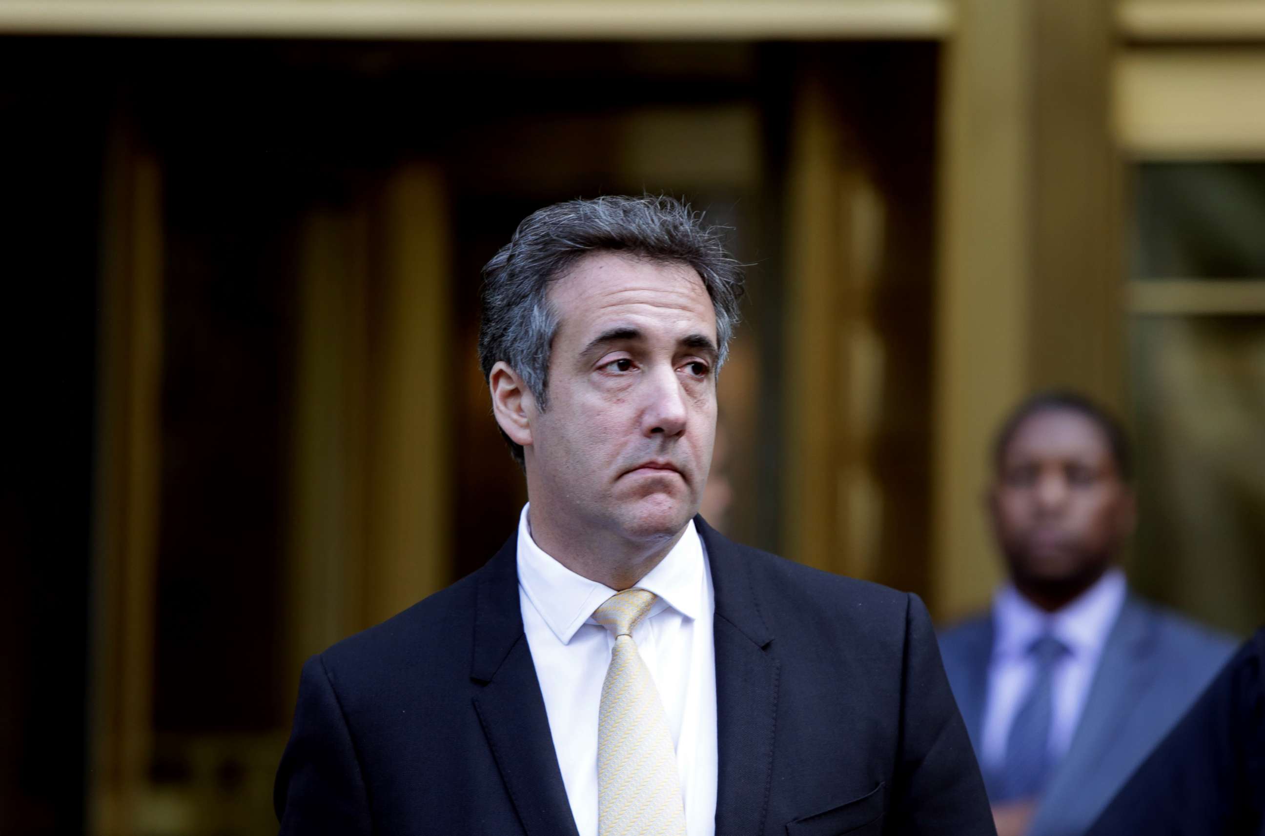 PHOTO: Michael Cohen, former lawyer to President Donald Trump, exits the Federal Courthouse on Aug. 21, 2018 in New York City.