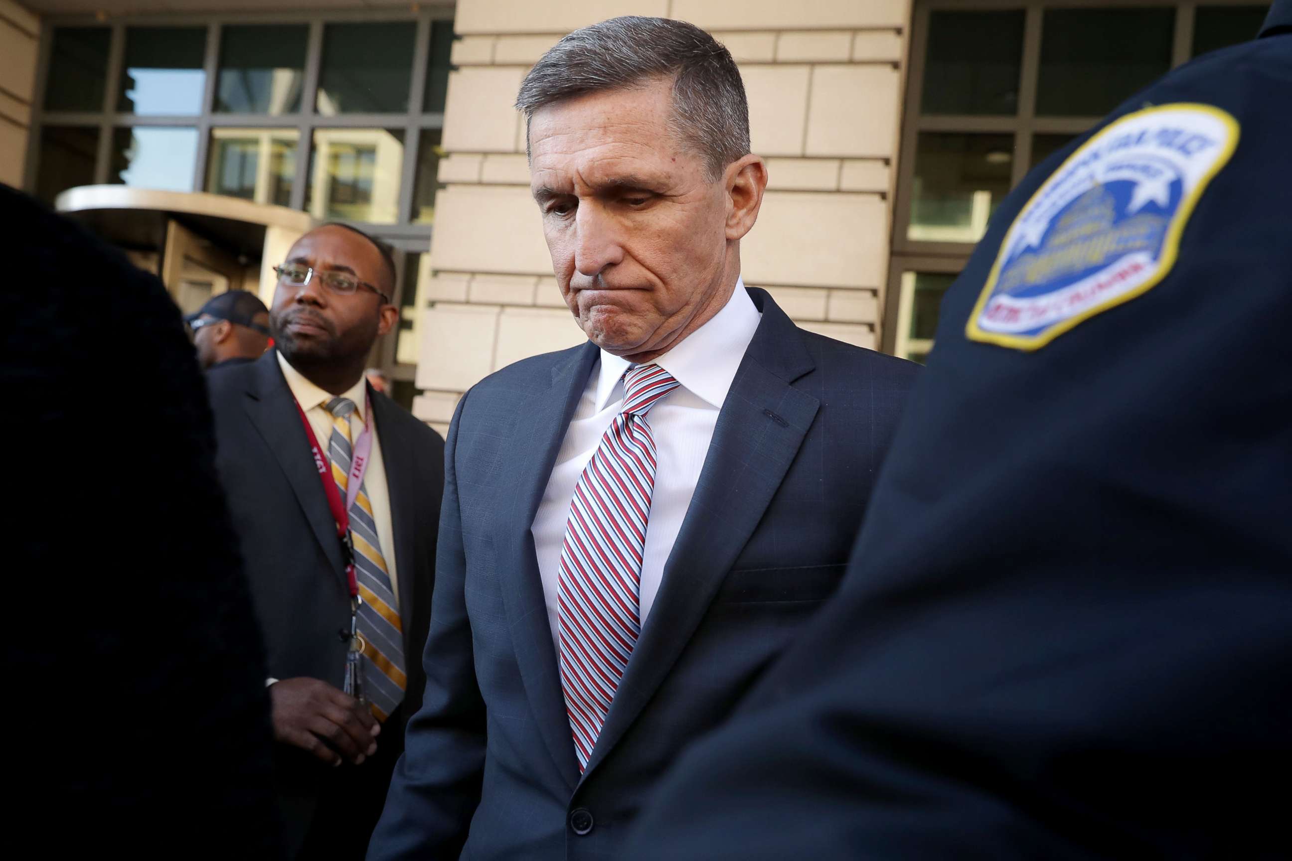 PHOTO: Former White House National Security Advisor Michael Flynn leaves the Prettyman Federal Courthouse following a sentencing hearing in U.S. District Court, Dec. 18, 2018, in Washington.