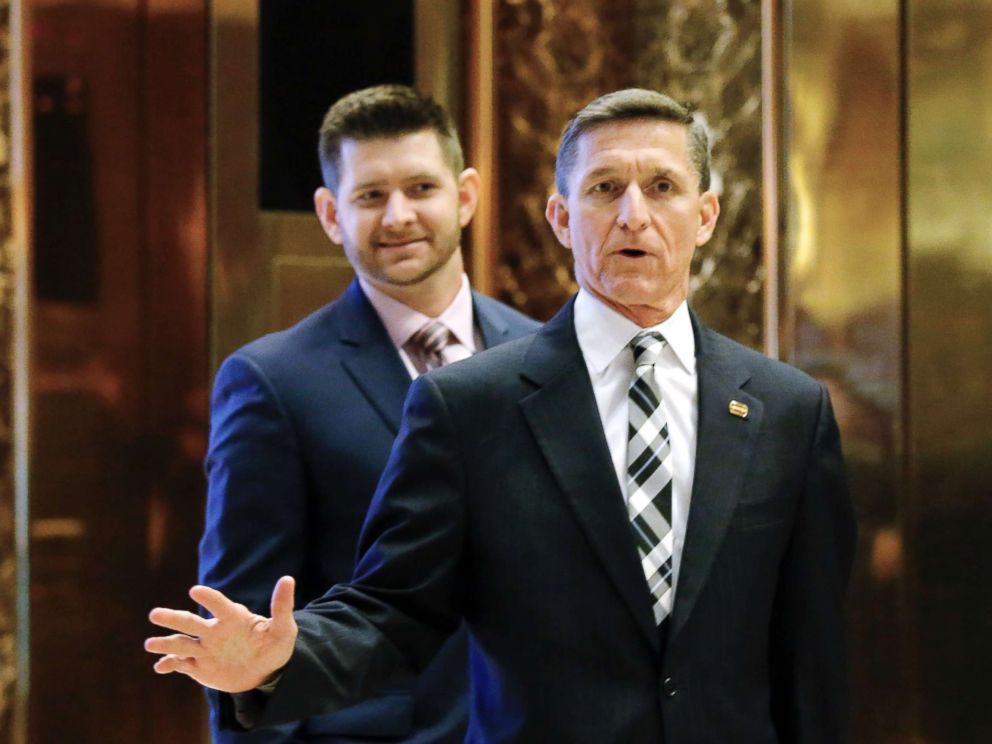 PHOTO: In this file photo dated Nov. 17, 2016, Michael Flynn Jr. is seen behind his father, retired Lt. Gen. Michael Flynn, as they arrive at Trump Tower in New York City.