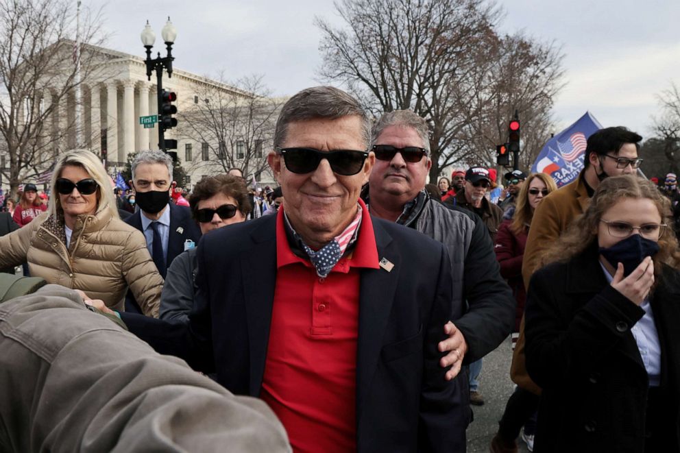 PHOTO: In this Dec. 12, 2020, file photo, former U.S. national security adviser Michael Flynn looks on as supporters of President Donald Trump rally to protest the results of the election in front of Supreme Court building, in Washington, D.C.