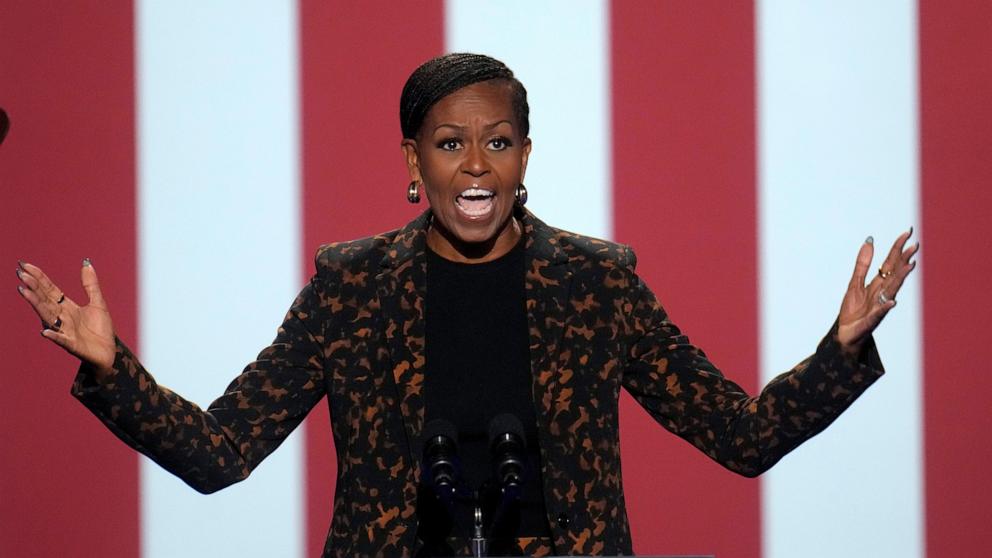 PHOTO: Former first lady Michelle Obama speaks at a campaign rally for democratic presidential nominee Vice President Kamala Harris at the Wings Event Center, in Kalamazoo, Mich., Oct. 26, 2024. 