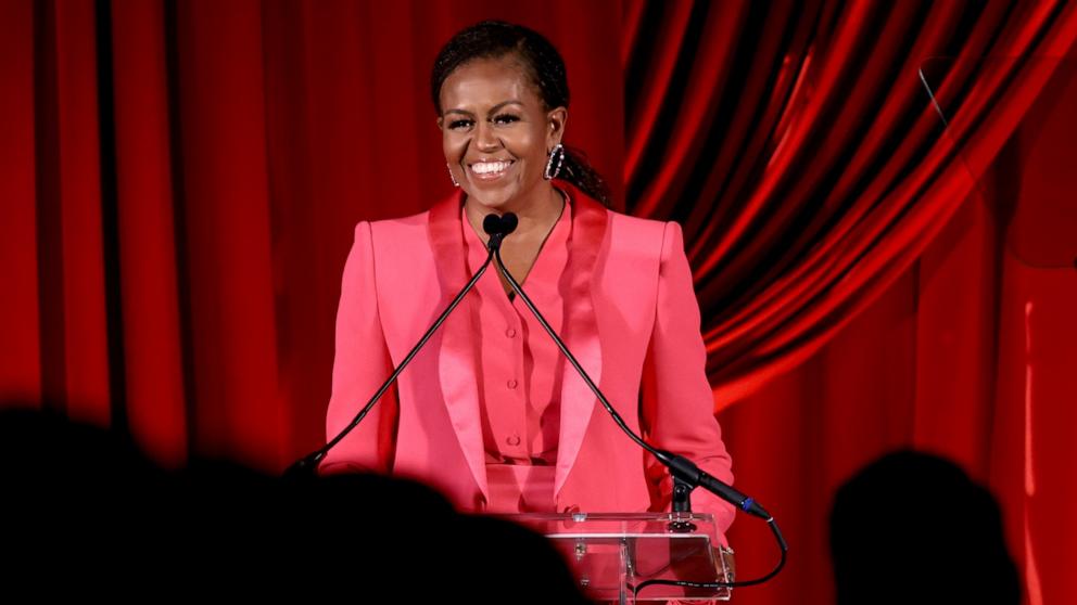 PHOTO: Former First Lady Michelle Obama speaks onstage at the Clooney Foundation For Justice Inaugural Albie Awards at New York Public Library on Sept. 29, 2022 in New York City. 