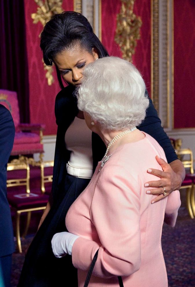 PHOTO: First lady Michelle Obama touches Britain's Queen Elizabeth II during a reception at Buckingham Palace in London, April 1, 2009.