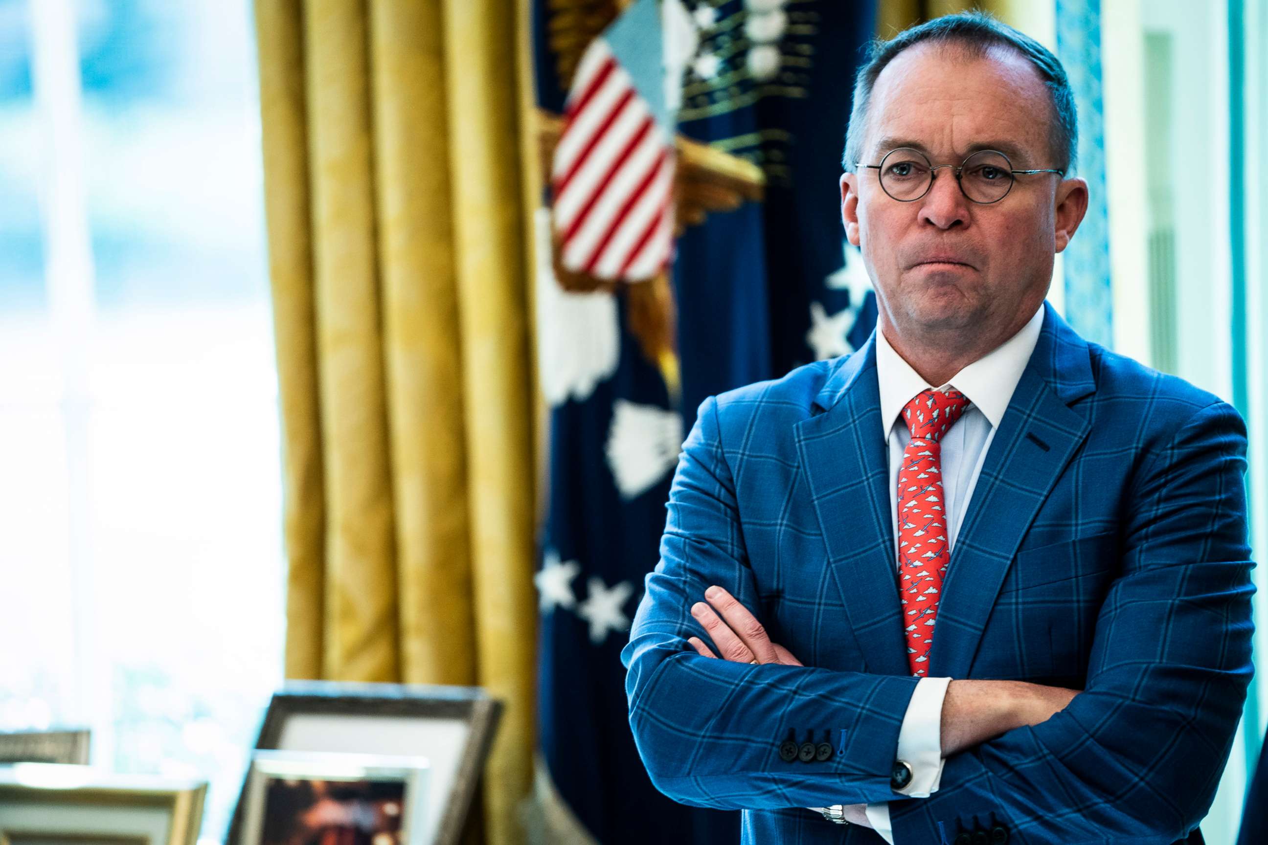 PHOTO: In this March, 2, 2020, file photo, Acting White House Chief of Staff Mick Mulvaney listens as President Donald Trump holds a meeting in the Oval Office at the White House in Washington, DC.