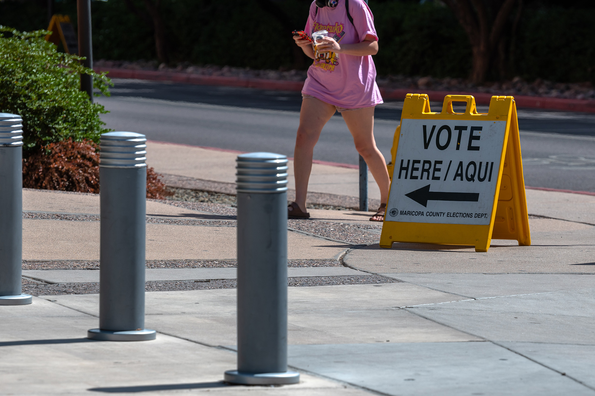 PHOTO: A voter arrives to a polling location at Arizona State University in Tempe, Ariz., Aug. 2, 2022. 