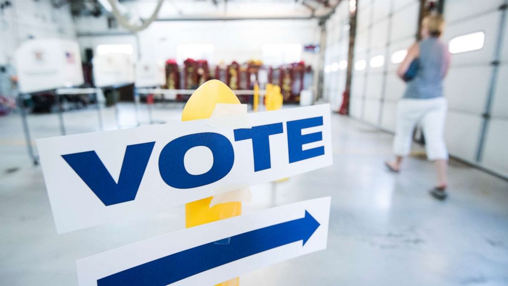 Signs direct voters at the Philomont, Va fire station in Virginia's 10th Congressional district on primary election day, June 12, 2018.