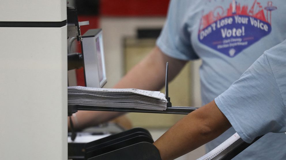 PHOTO: Workers sort through ballots in the delayed processing at the Clark County Election Department for the Nevada midterm elections in Las Vegas, Nov. 9, 2022.