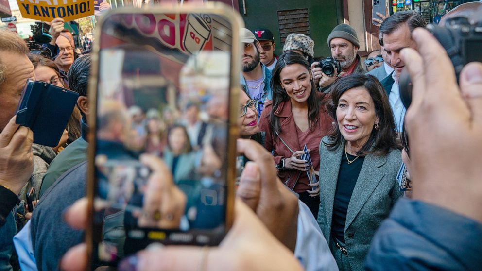 PHOTO: Gov. Kathy Hochul campaigns with Representative Alexandria Ocasio-Cortez in New York, Nov. 8, 2022.