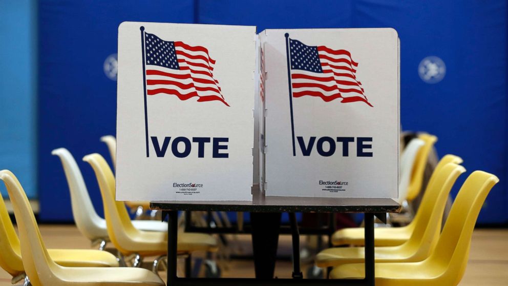 Empty chairs are seen at a polling place, Nov. 7, 2017, in Alexandria, Va.
