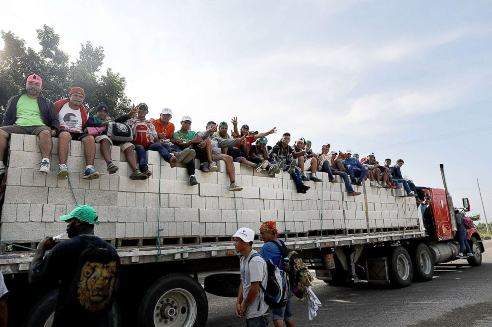 PHOTO: Thousands of Central American migrants in the caravan get a lift to a camp for the evening, Oct. 30, 2018, in Juchitan de Zaragoza, Mexico.