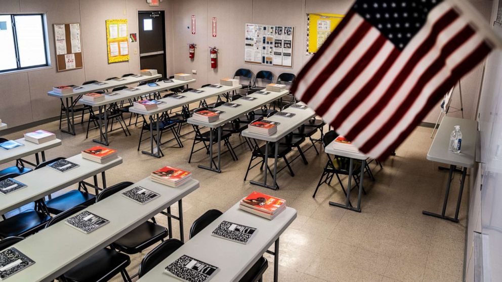 PHOTO: Text books and notebooks line tables inside a classroom at a Influx Care Facility for unaccompanied children on Feb. 21, 2021, in Carrizo Springs, Texas.