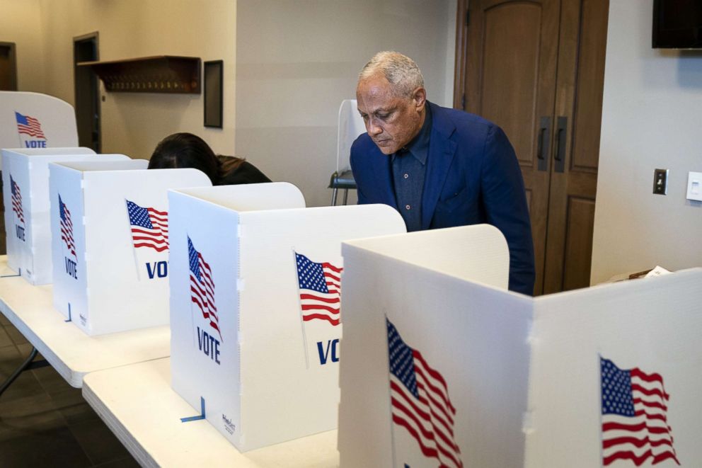 PHOTO: Democratic candidate for U.S. Senate Mike Espy votes at a polling place at Highland Colony Baptist Church, Nov. 27, 2018, in Ridgeland, Mississippi.